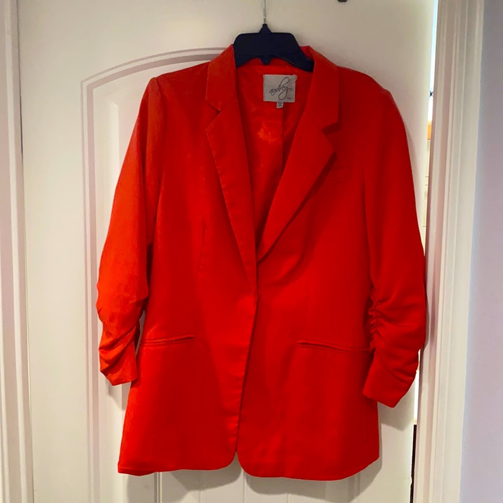 Coral colored size large women’s blazer